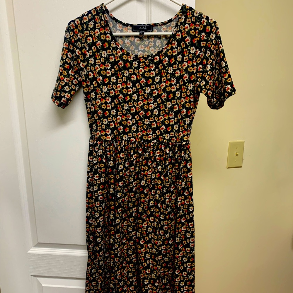 multi colored flowered dress. Super comfortable and looks cute with belt.